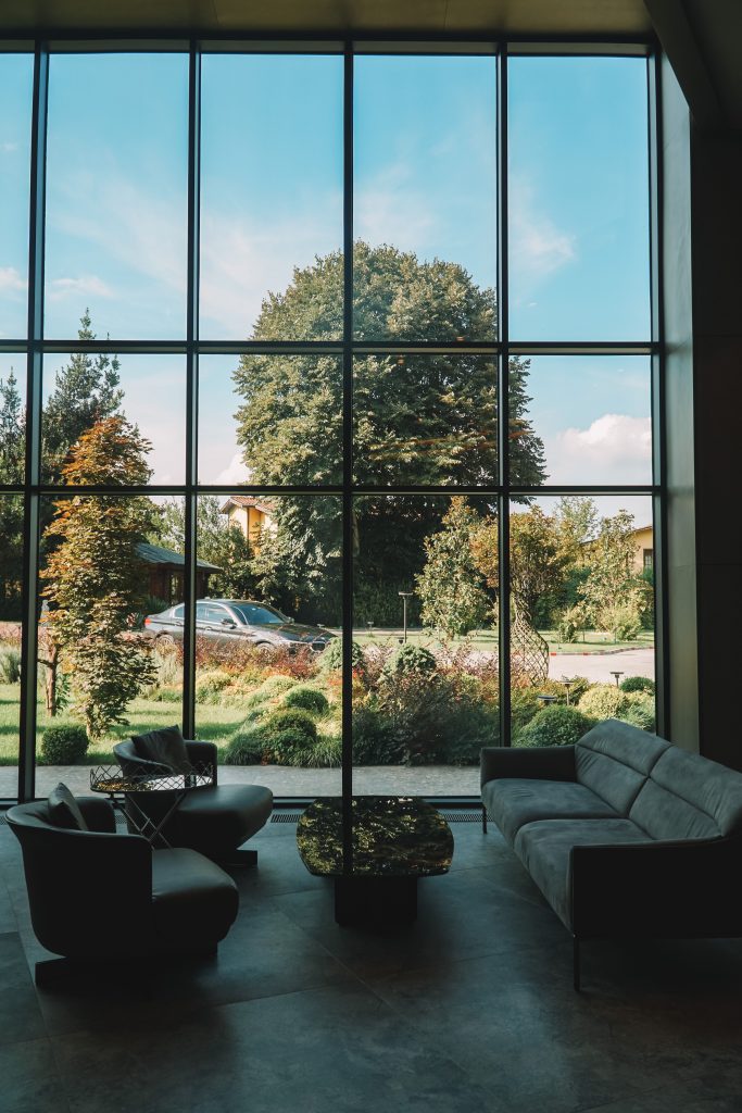 Spacious living room with large windows overlooking a lush garden in Sapanca, Turkey.